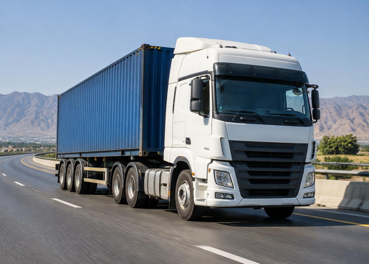 Container truck travelling on a highway in Pakistan